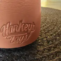 The Hankey's Toys logo pressed into the silicone at the base