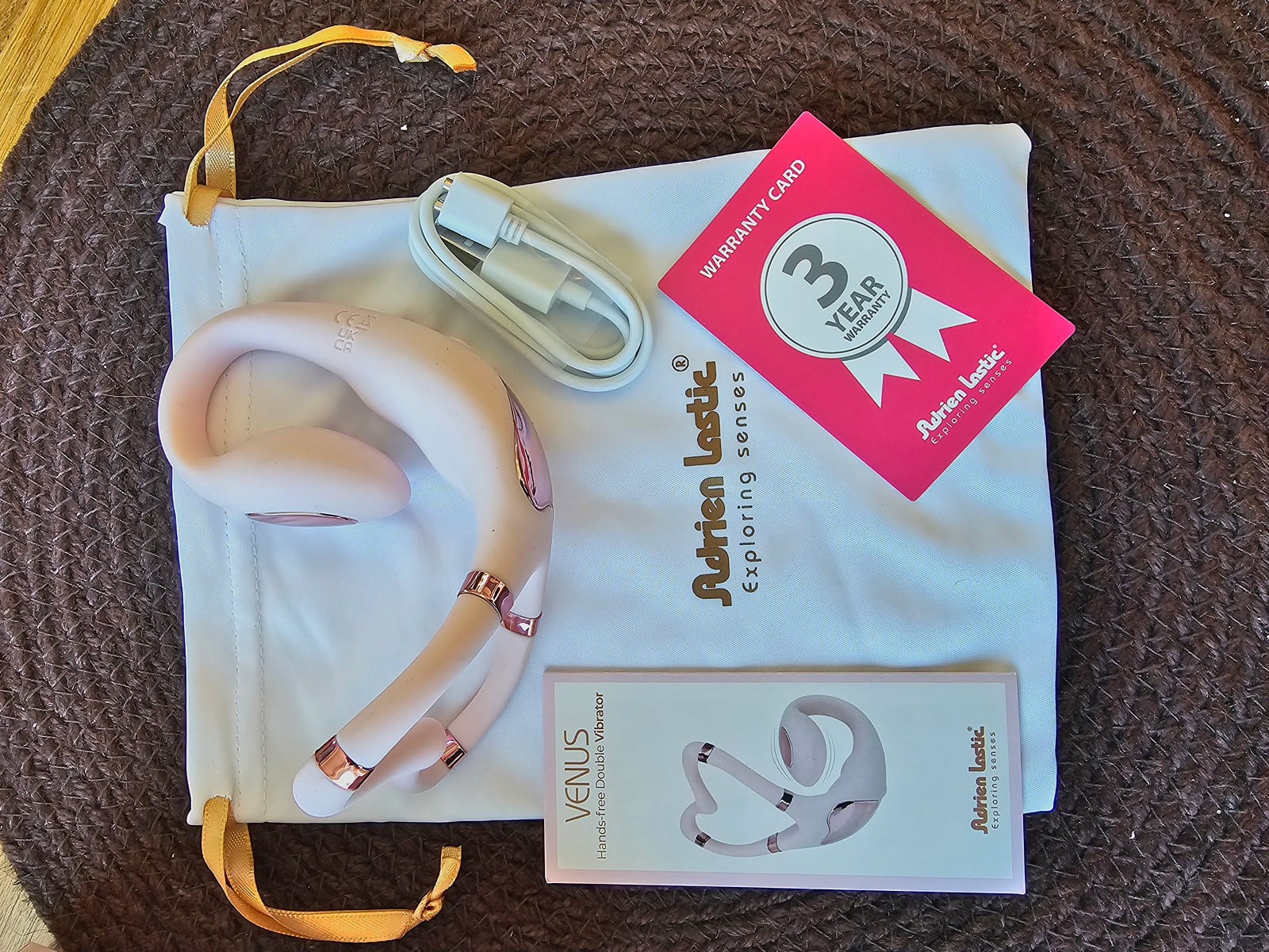 Toy, magnetic USB charger, storage pouch, manual and three-year warranty card